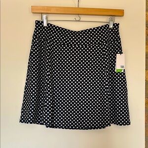 TAIL Golf Skort. Black/White. Size L. New with tags.